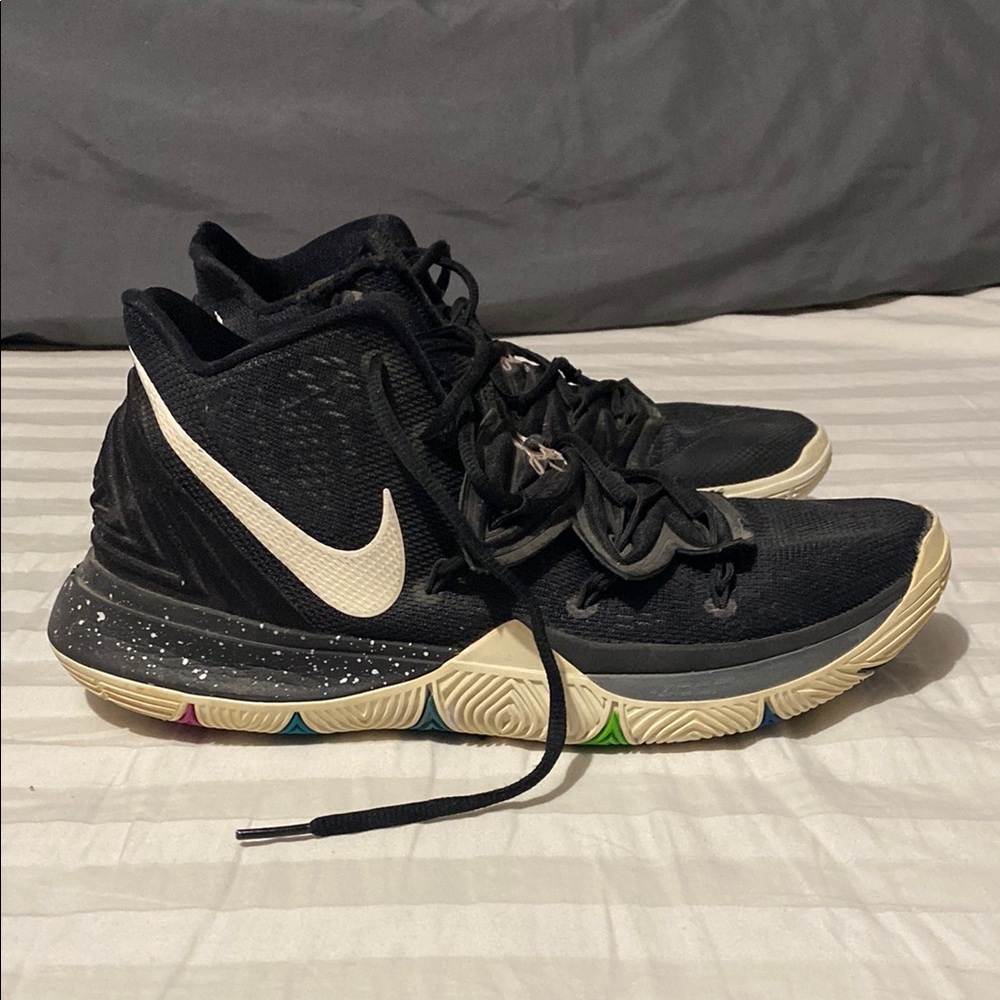 Nike Black and White Athletic Shoes with Breathable Upper and Cream Swoosh